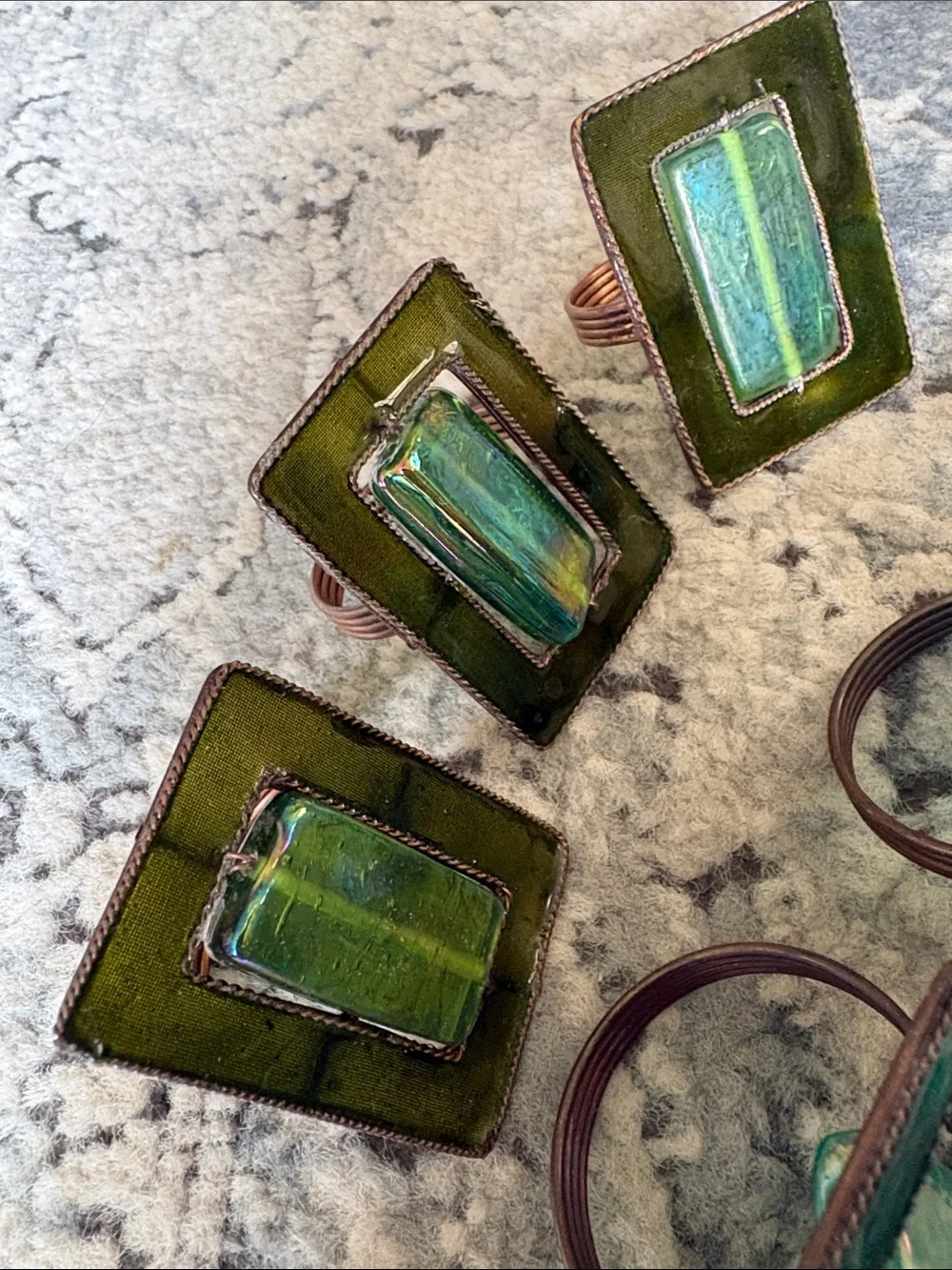 Pier 1 Vintage set of: 6 green blue glass copper napkin rings.